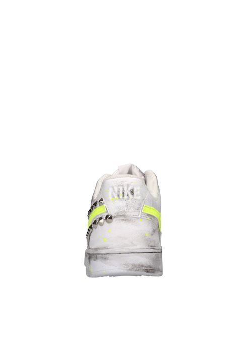 Sneakers in ecopelle e borchie NIKE SEDDYS | NISE235254246BIANCO-GIALLO